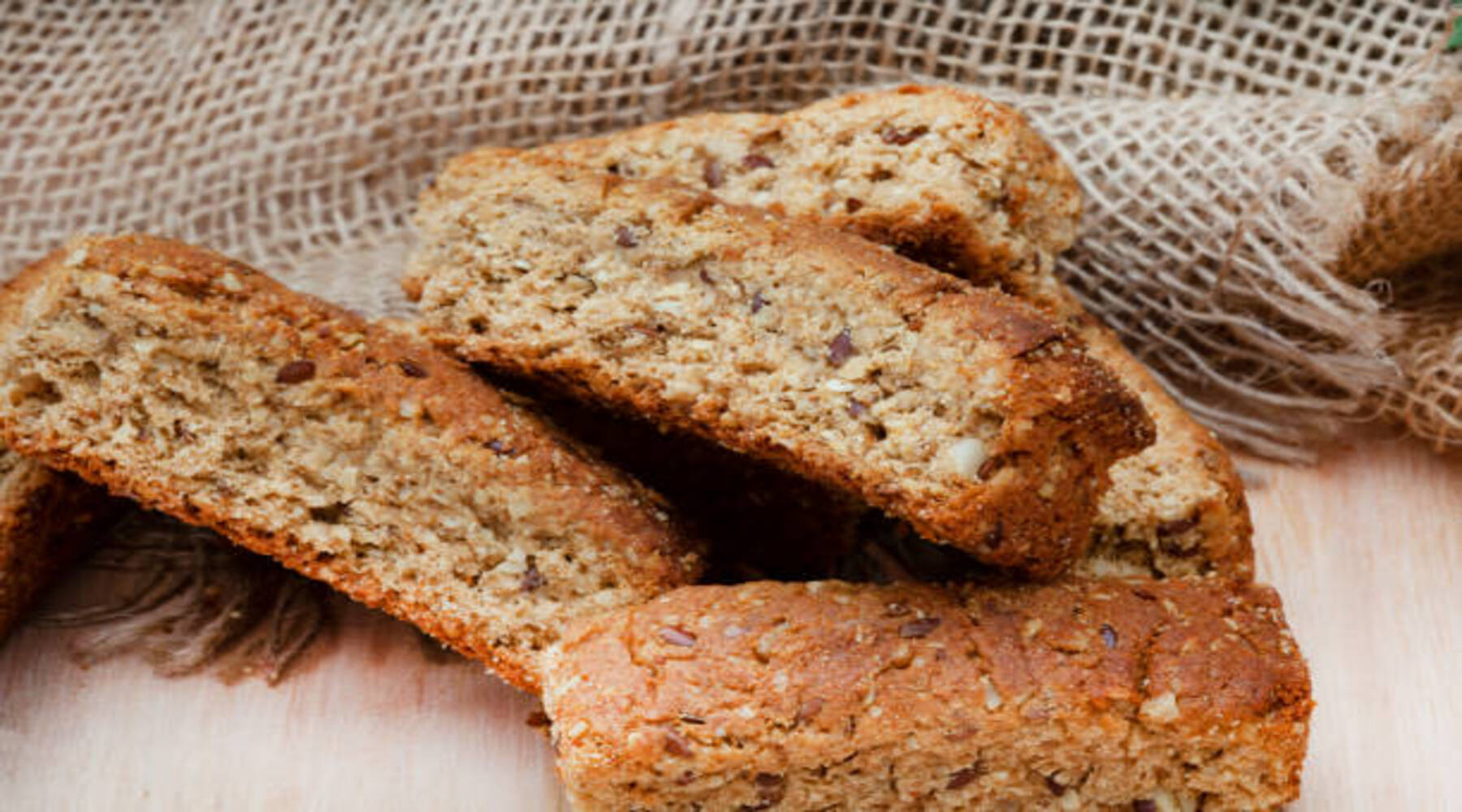 South African wholegrain or bran rusks with seeds on rustic table